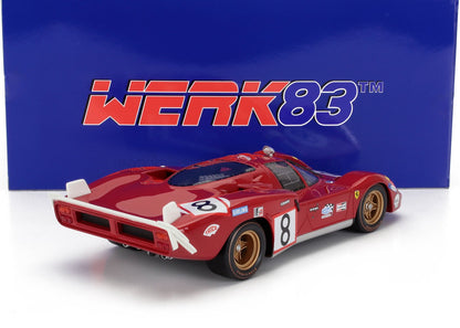 Modellino vintage rosso di una Ferrari da corsa con il numero 8 e ruote dorate, esposto con scatola blu WERK83, disponibile su Vroomi.