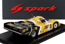 Modellino Porsche 962C New Man in scala 1/43, giallo e nero, di Spark, che puoi trovare su Vroomi.