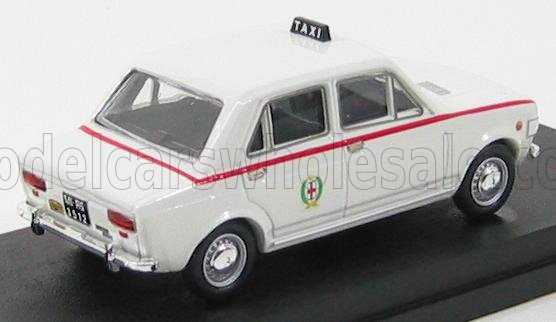 Modellino di taxi vintage bianco con striscia rossa ed emblema, esposto su base nera, disponibile su Vroomi.