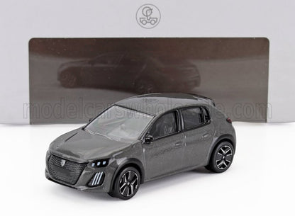 Modello in scala grigia di un'auto hatchback a 4 porte su una superficie bianca con confezione con marchio, disponibile su Vroomi.