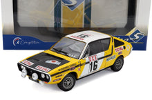 Modellino di auto da rally giallo e nero in scala 1:18, disponibile per i collezionisti su Vroomi.