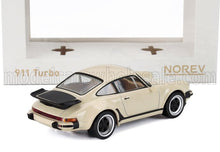 Modellino vintage Porsche 911 color crema con spoiler e ruote neri, disponibile su Vroomi.