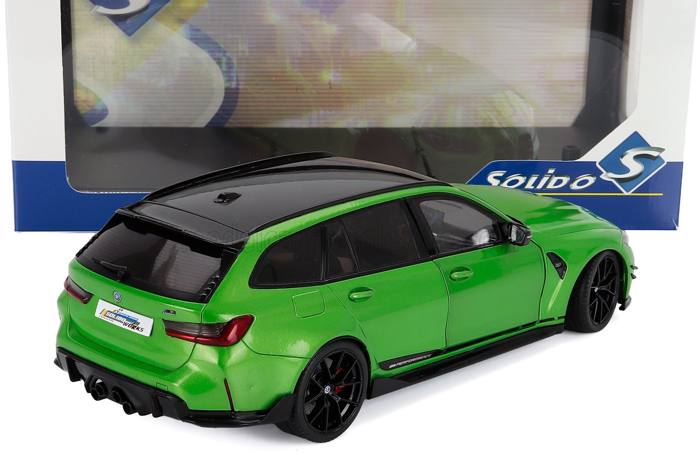 Green 1:18 scale BMW M3 Touring die-cast model car, detailed, available for collectors now.