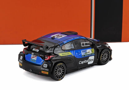 Modellino di auto da rally Toyota blu e nera con il numero 20 e il marchio CapitalBox, disponibile su Vroomi.