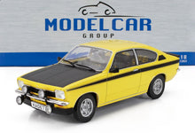 Modellino in scala di Opel Kadett giallo con cofano nero e striscia, dettagliato, in metallo pressofuso 1/18, disponibile su Vroomi.