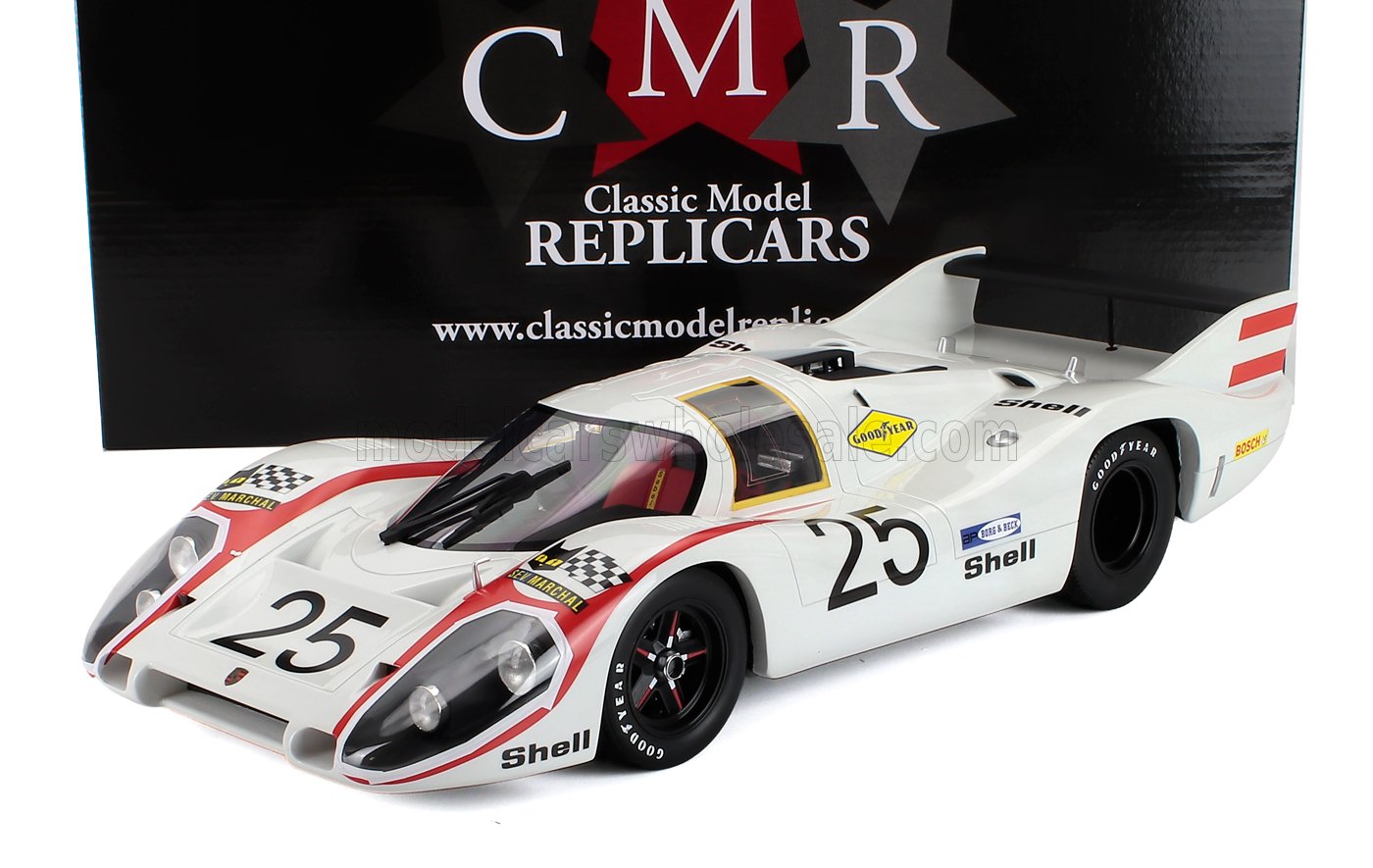 White Porsche 917 race car model with number 25 and Shell logos, shown with Classic Model Replicars box, offered on Vroomi