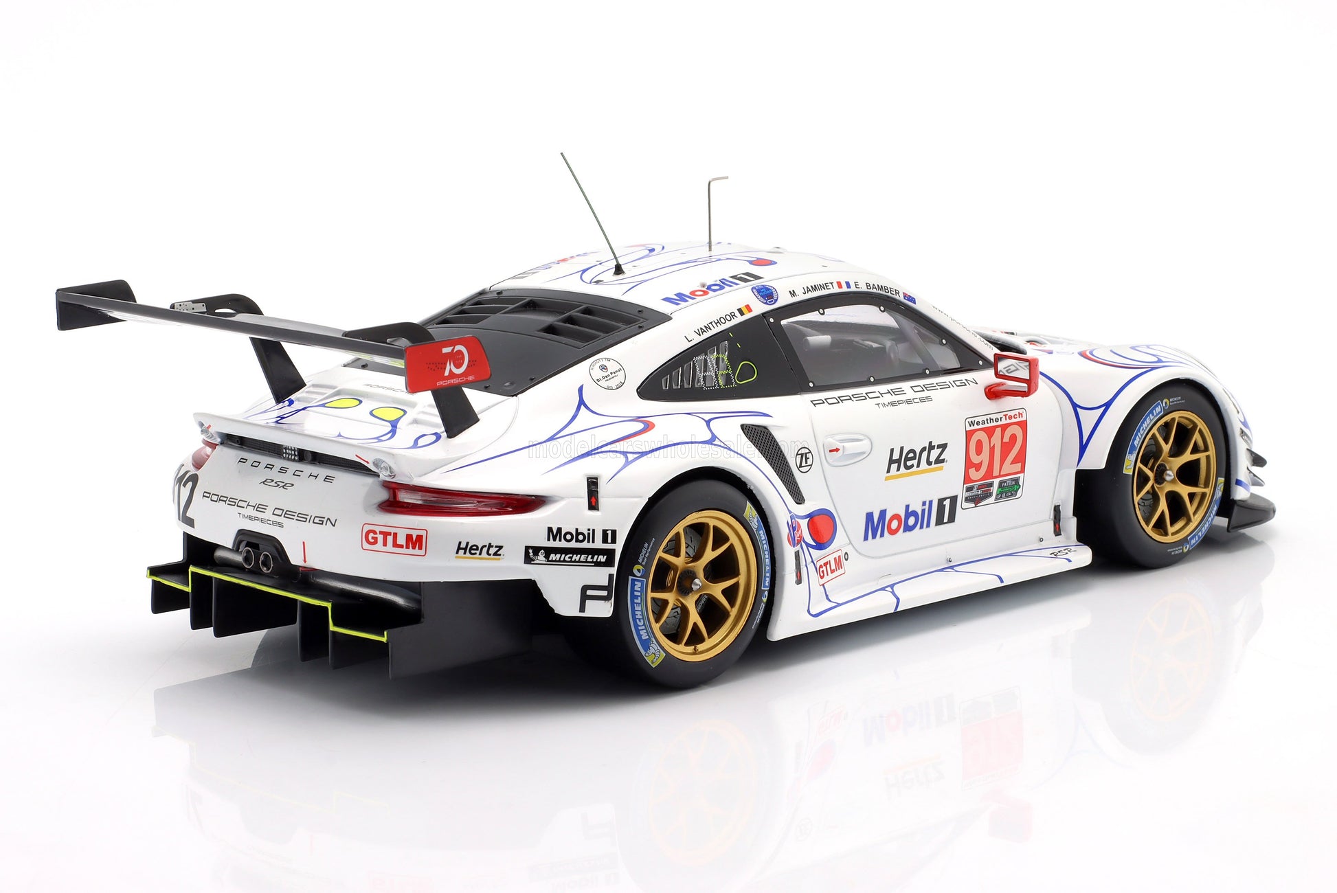 White Porsche 911 RSR race car with Mobil 1, Hertz, GTLM, and Michelin logos is now offered on Vroomi