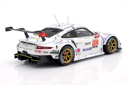 White Porsche 911 RSR race car with Mobil 1, Hertz, GTLM, and Michelin logos is now offered on Vroomi