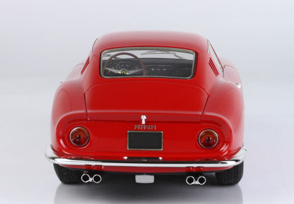 Vista posteriore di una classica Ferrari rossa d'epoca con doppio scarico, disponibile su Vroomi.