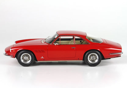 Side view of a classic red vintage sports car with wire wheels, available through Vroomi