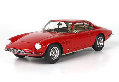 Red vintage sports car model with chrome wheels and detailed interior available to buy via Vroomi