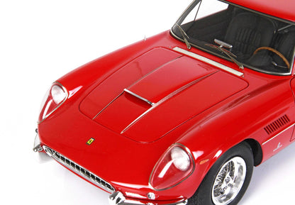 Red vintage Ferrari model car with detailed hood, windshield, and chrome wire wheels, available on Vroomi platform