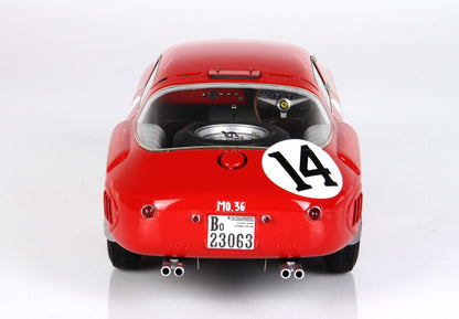 Rear view of red vintage race car model with number 14, spare tire inside, and dual exhausts, now offered on Vroomi