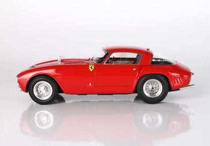 Side view of a classic red Ferrari vintage sports car with wire-spoke wheels, offered on Vroomi platform