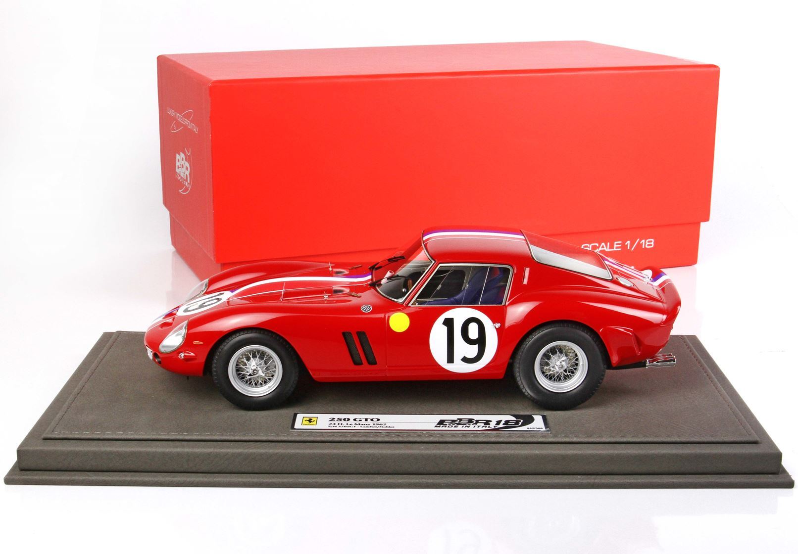 Red 1:18 scale Ferrari 250 GTO model car with number 19, displayed on base, available on Vroomi