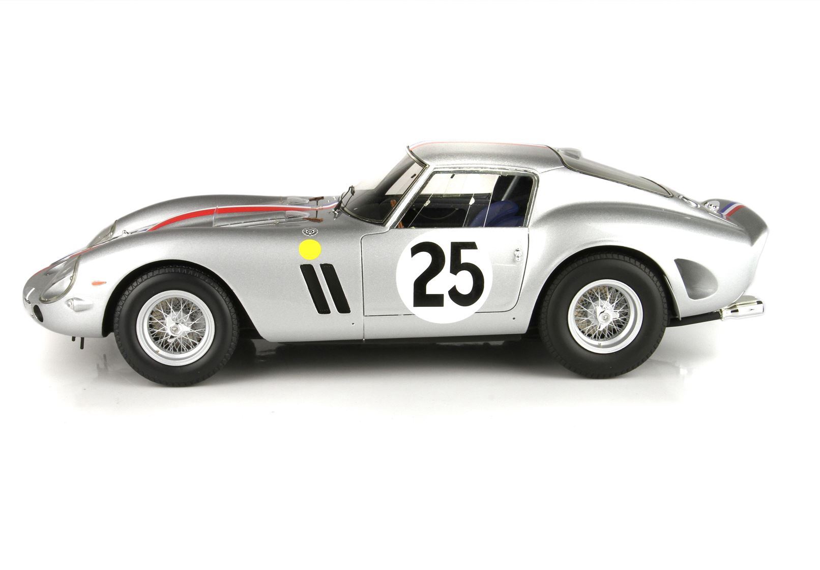 Silver vintage race car number 25 with wire-spoke wheels and red stripe, available on Vroomi