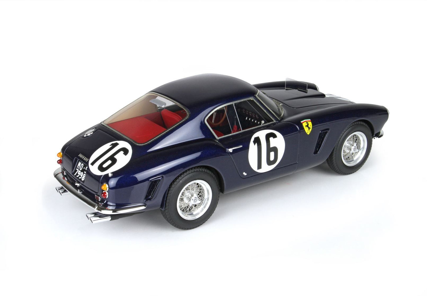 Dark blue vintage Ferrari race car model with number 16, red interior, available on Vroomi