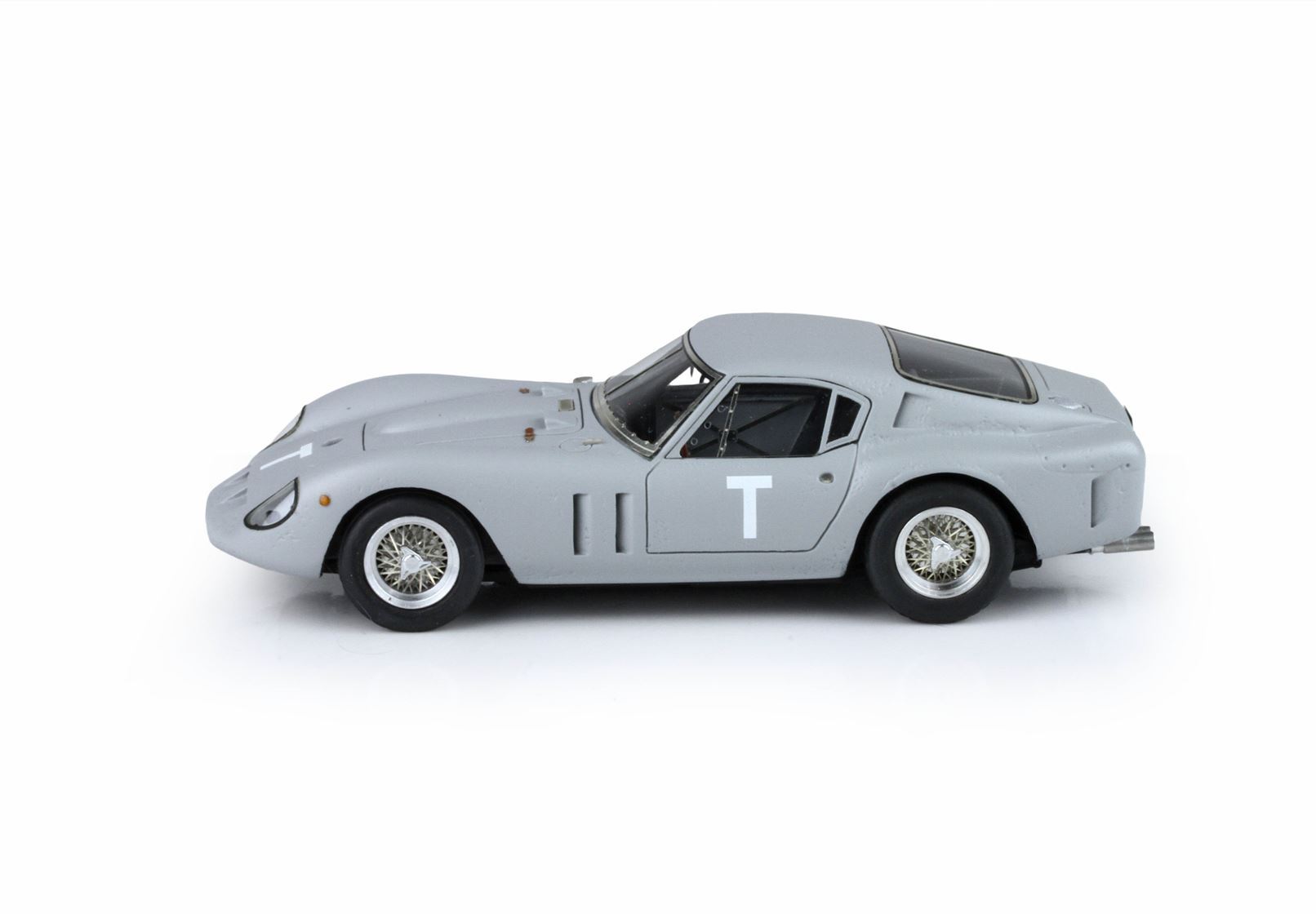 Gray vintage race car model with letter T on door, wire wheels, available on Vroomi