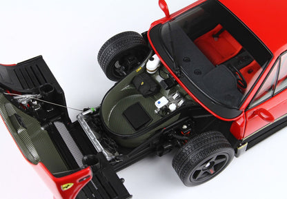 Top view of red Ferrari model car with open front trunk showcasing detailed engine components and interior; available on Vroomi equivalent