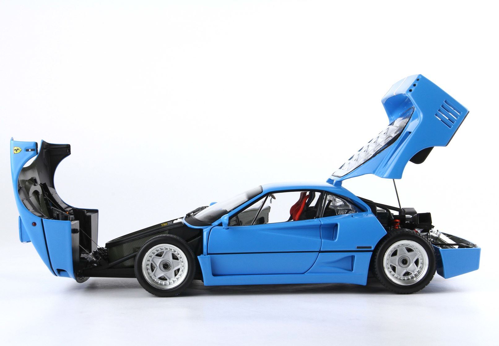 Blue Ferrari F40 sports car model with open front and rear hoods, detailed interior, available on Vroomi platform